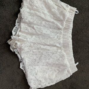 White floral high rise shorts